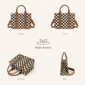Black and white checkerboard tote bag with brown leather trim and shoulder strap