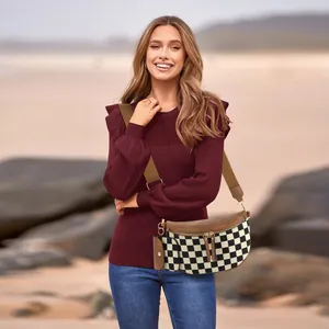 Classic checkerboard crossbody waist bag with brown leather trim and wide nylon strap