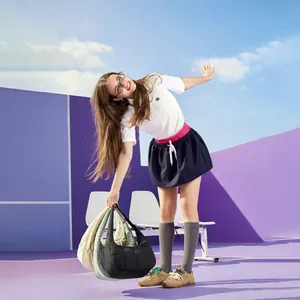 Quilted nylon half-moon shoulder bags in multiple colors shown in a lifestyle shot
