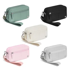 Pochette de poignet en nylon imperméable avec plusieurs compartiments en cinq couleurs