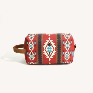 Close-up of red Bohemian PU leather toiletry bag with tribal geometric patterns