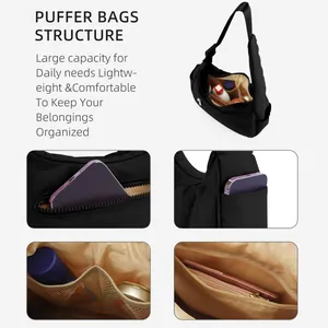 Detail showing the internal structure and multi-pocket organization of black puffer bag