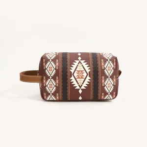 Detail view of Bohemian PU leather toiletry bag with ethnic patterns and side strap