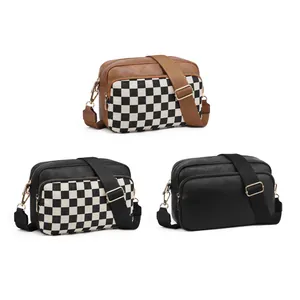 Three stylish PU leather crossbody bags in checkered and solid colors with wide straps