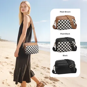 Detailed comparison of checkerboard and solid leather crossbody bags with adjustable straps