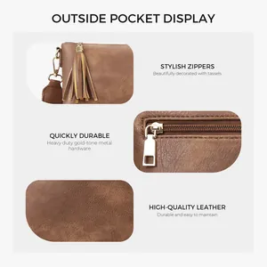 Brown leather crossbody bag with stylish gold zippers and fringe tassel details