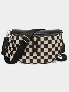 Detail of checkered crossbody bag with adjustable strap and detachable mini coin pouch
