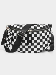 Detail of checkered half-moon crossbody bag with detachable earphone pouch and gold hardware