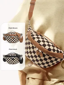 Close-up of checkerboard crossbody bag with adjustable strap and premium leather trim