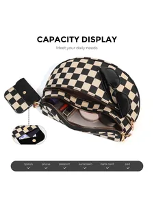 Detail view of checkerboard shell crossbody bag showing large internal capacity