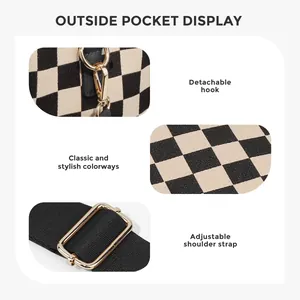 Detail of woven checkerboard tote with gold metal hooks and adjustable strap