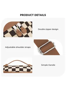 Detail of checkerboard bag with double zipper, adjustable strap, and simple top handle