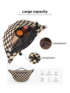 Detail view of checkerboard crossbody bag with inner zippered pocket and anti-theft back pocket