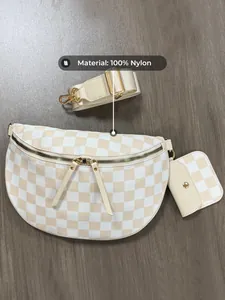 Detail of cream checkerboard crossbody bag set with 100% nylon material label