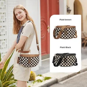 Black and white checkered chest bag with matching round earphone case and wide strap