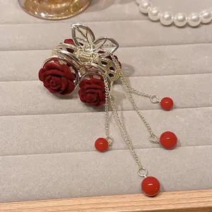Flocked red rose hair claw clip with golden tassels and pearl accents for women