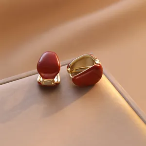 Elegant red oval enamel huggie hoop earrings with gold plated finish for women