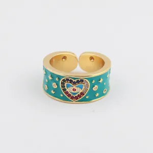 Anello cuore malocchio bohémien con zirconi colorati e fascia in smalto turchese