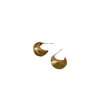 French vintage matte gold C-shape stud earrings with textured brushed metal finish