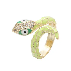 Creative gold snake open ring with green enamel scales and sparkling crystal accents