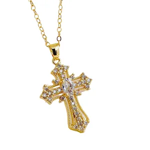 Elegant gold-plated cross pendant necklace with sparkling cubic zirconia on white background