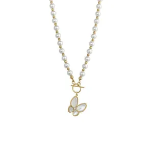 Elegant pearl and gold bead necklace with a butterfly pendant and OT toggle clasp