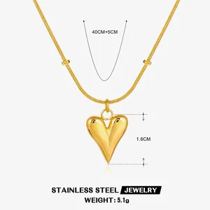 Gold minimalist heart pendant necklace in stainless steel with measurement details