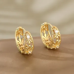 Elegant gold-plated hoop earrings with vintage hollow floral patterns and zircon inlays