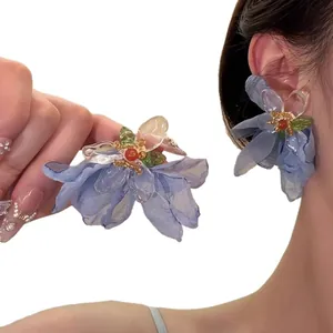 Vacation style light blue fabric flower earrings for women with oversized floral design