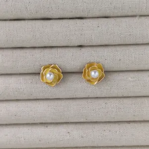 Elegant yellow camellia stud earrings with center pearl and S925 silver needles