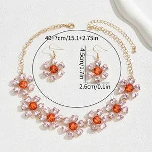 Roze bloemen sieradenset met kristallen hart ketting en oorbellen in goud plating