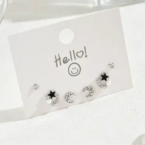 Elegant 6-piece silver star and moon earring set with cubic zirconia and white pearls