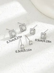 Detailed view of silver zircon stud earring set in square and round shapes