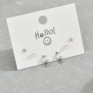 Set di tre paia di orecchini a lobo in argento a forma di stella e luna con zirconi
