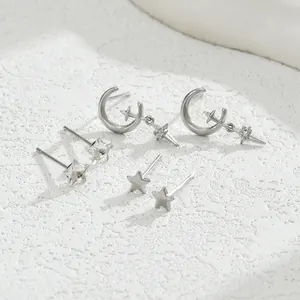 Set di tre paia di orecchini a lobo in argento con motivi a luna e stelle