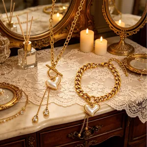 Vintage gold-plated heart pearl necklace and bracelet set with T-bar clasp detail