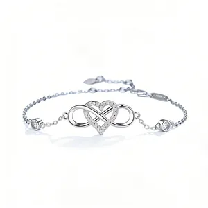 Macro shot of 925 sterling silver infinity heart bracelet with sparkling cubic zirconia