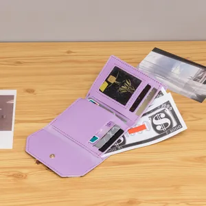 Interior layout of lilac purple tri-fold wallet with card slots and bill compartment