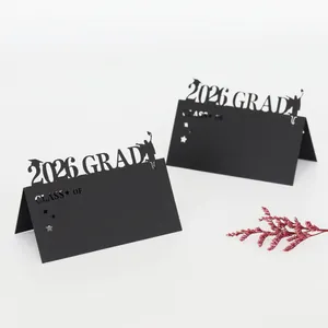 2026 graduation table place card featuring black laser-cut doctoral cap and silhouette