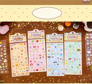 Detailed view of four packs of cute Mr. Paper foam stickers for journal decoration