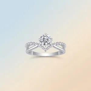Elegant S925 sterling silver moissanite ring with V-shaped pavé band and four-prong setting