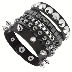 Detailed view of punk leather bracelets with spikes, rivets and metal chains