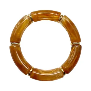 Bracciale retrò bohémien in acrilico con texture ambra leopardo e distanziatori in oro