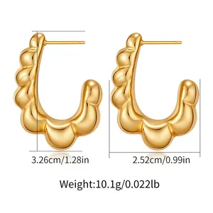 Detailed view of gold C-shape irregular earrings with dimensions and weight info