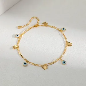 Bracelet de cheville papillon doré 18 carats avec perles œil bleu et chaîne Figaro