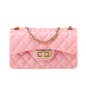 Quilted jelly crossbody bag in pastel pink with golden chain strap and lock
