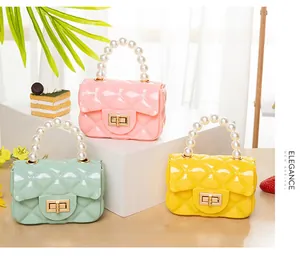Close-up of mini jelly bags with pearl handles and diamond quilted pattern details