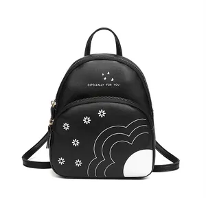 Mini black backpack with daisy print and Especially For You text on white background