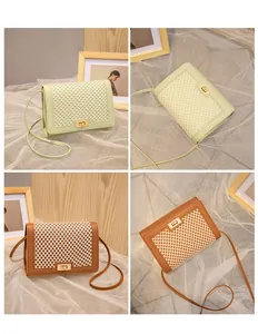 Detail of mint green and brown crossbody bags featuring hexagonal mesh and gold twist lock