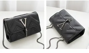Macro detail of black chevron quilted leather bag with gunmetal V-logo and fringe